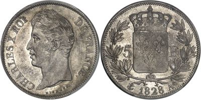 a silver coin with a crown on the front and a crown on the back