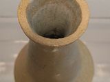 a small vase that is sitting on a table
