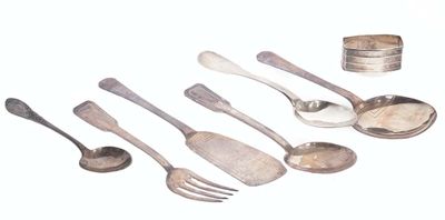 several spoons, forks, and a tin are arranged on a white surface