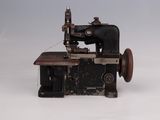 an old sewing machine that is sitting on a table