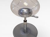 an image of a glass table lamp on a metal base