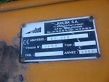 a close up of a sign on the side of a tractor