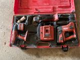 an image of a red tool box with tools inside of it