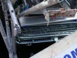 a pile of junk in the back of a truck