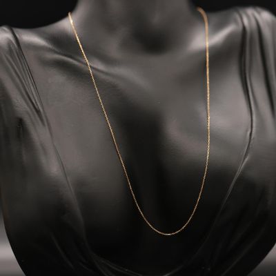 a gold chain necklace on a mannequin mannequin mannequin mannequin mannequin mannequin mannequin mannequin manne