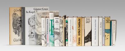 many books that are lined up on a shelf