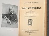 an old book with a picture of a man in a suit