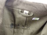 a picture of a close up of a jacket with a tag on it