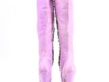 pink high heeled boots with pearls on the side of them