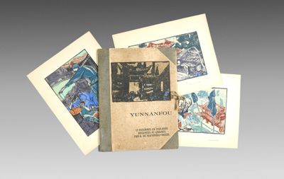 plusieurs livres sont empilés sur une table