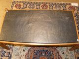 an image of a table on a rug on the floor