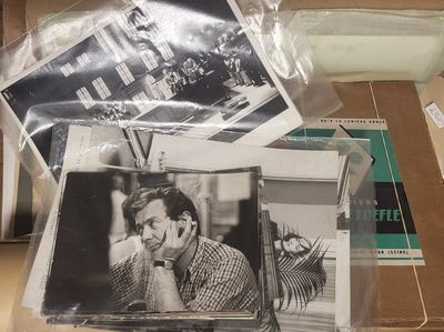 several black and white photos of a man sitting on top of a table