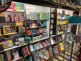 many books on the shelves in the store