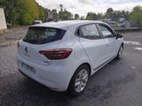 a white car that is parked in a parking lot