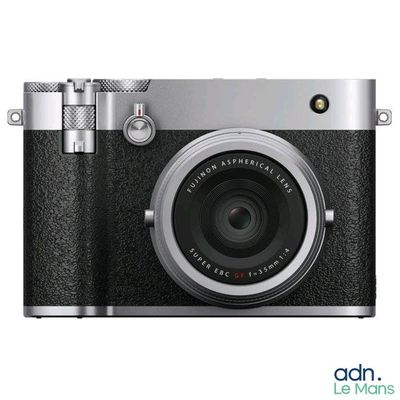 a silver camera with a black lens on a white background