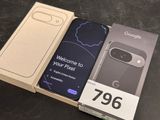 an open box with a phone inside of it sitting on a table