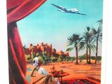 Une affiche d'Air France est accrochée au mur.