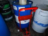 a blue and white drum with a red handle and a red hand truck