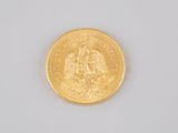 an image of a gold coin on a white surface
