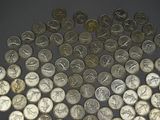 a lot of coins that are on the table