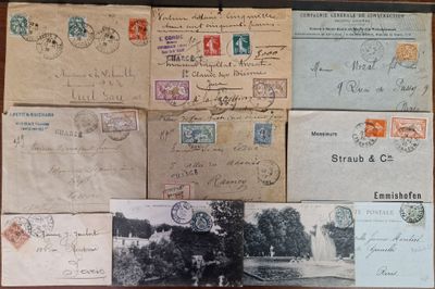 several old postcards and envelopes on a table with a black and white photo of a man
