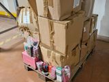 a stack of boxes sitting on a pallet in a warehouse