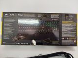 a box with a keyboard inside of it on a table