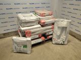 many boxes of mattresses stacked on top of each other