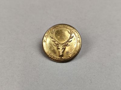 a close up of a coin with a deer head on it