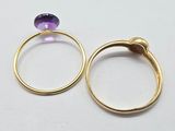 pair of gold rings with amethorate and amethorate
