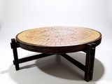 a coffee table that has a circular design on it
