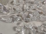 a lot of clear glass pieces on the table