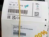 a roll of black cord with a price tag on it
