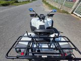a motorcycle that is parked on the side of the road