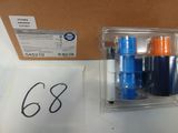 a box of six blue and orange spray bottles in it