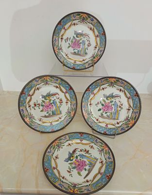 CP&CIE France Suite de 4 assiettes en porcelaine à décor pol…