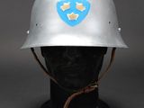 a close up of a helmet on a mannequin head