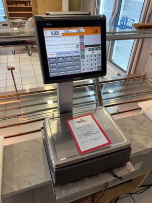 an image of a cash register on a counter