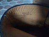 a close up view of a pair of shoes with a label on it