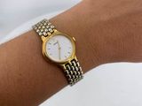 a close up of a person ' s wrist with a watch on it