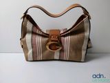 a picture of a purse with a brown and white stripe pattern