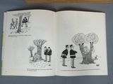 an open book with pictures of people and a tree
