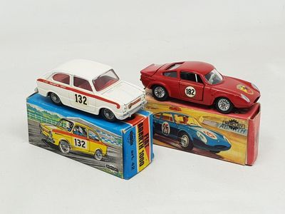three toy cars that are sitting on top of each other
