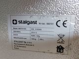a close up of a sign on a refrigerator door