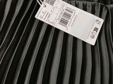 a close up of a black dress with a price tag on it