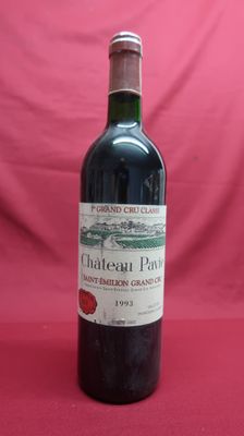 a bottle of wine that is sitting on a table