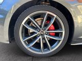 a close up view of a car ' s wheel and tire