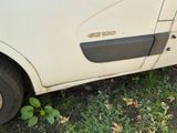 a car that has been left in the grass