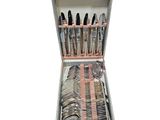 a suitcase with a bunch of silverware in it