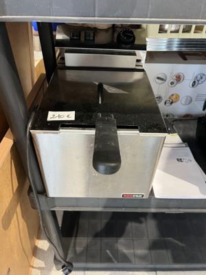 an image of a commercial deep fryer in a kitchen